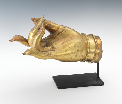 An Oversized Gilt Hand of Buddha