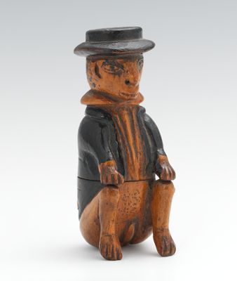 A Hand Carved Folk Art Wood Figural