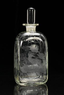 An Engraved Glass Decanter Stopper