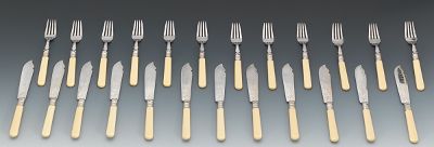 Twelve Victorian Fish Knives and 134546