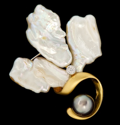 A Blister Pearl and Diamond Brooch