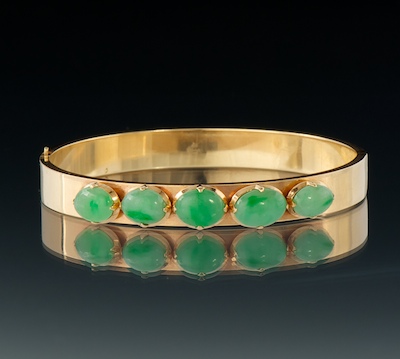 A Ladies' Gold and Jadeite Bangle