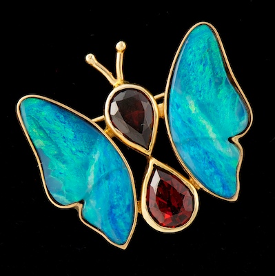 A Black Opal and Garnet Butterfly