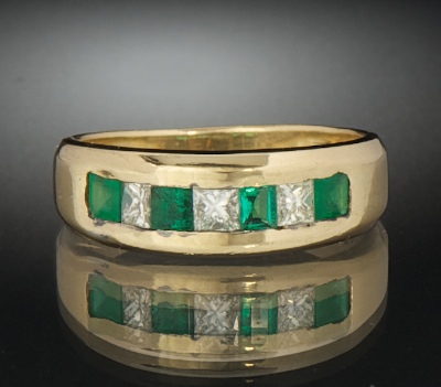 A Ladies' Emerald and Diamond Band