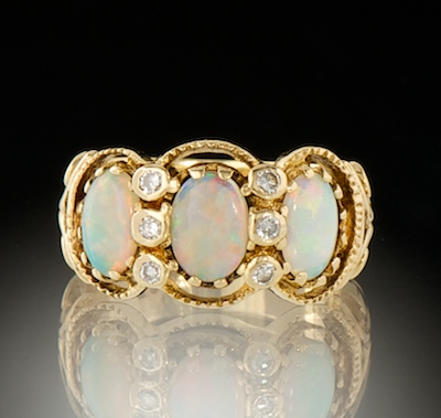 A Ladies Opal and Diamond Ring 1345f2
