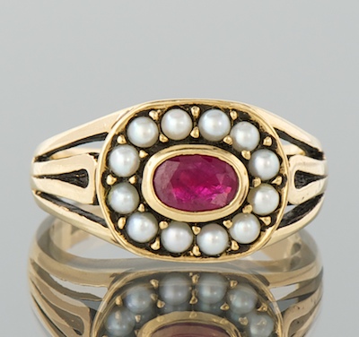 A Delicate Ruby and Pearl Ring
