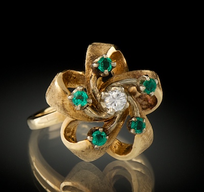 A Ladies' Diamond and Emerald Ring