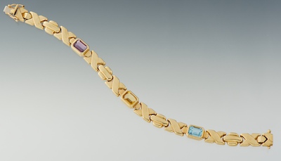 A Ladies Gold and Gemstone Bracelet 13463d