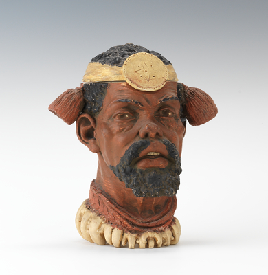 A Stylized African Figural Head Tobacco