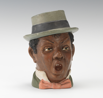 An Open Mouth Black Head Figural