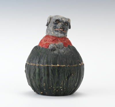 An Uncommon Figural Dog and Mellon