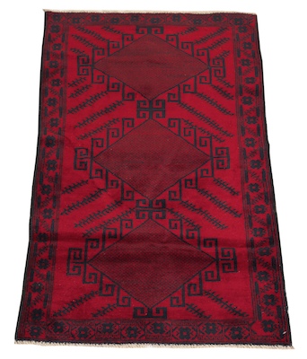 A Balouch Carpet Strong design in dark