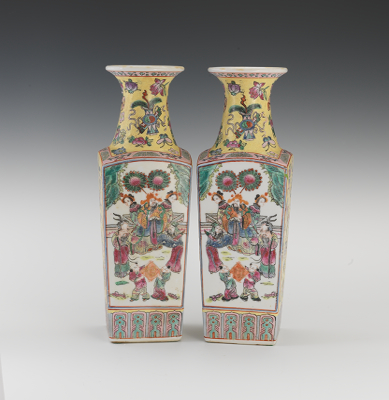 A Pair of Famille Jaune Vases Of