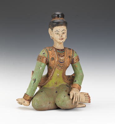 A Thai Carved Wood Figure of a Woman