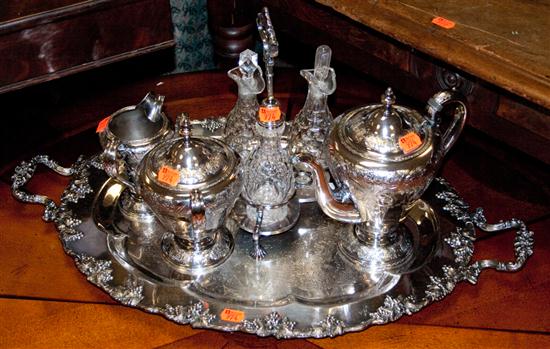 Silver-plated tea set and a cruet set