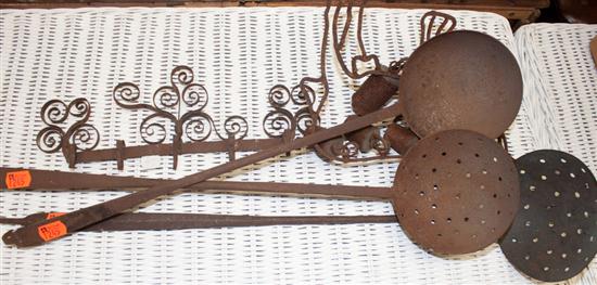 Assorted cast iron kitchen implements