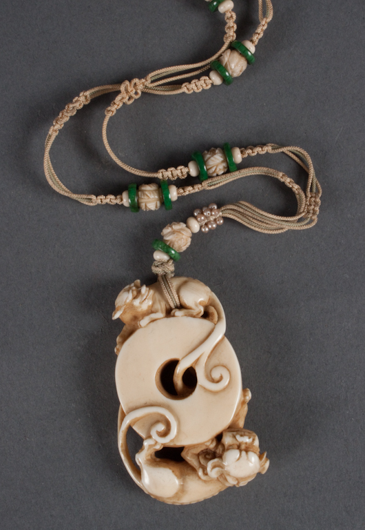 Chinese carved ivory pendant 19th Century
