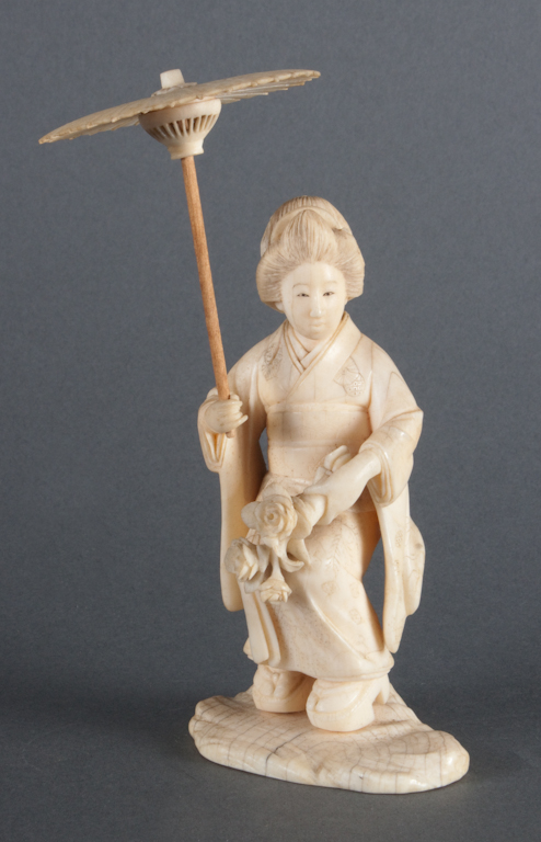 Japanese carved ivory figure of