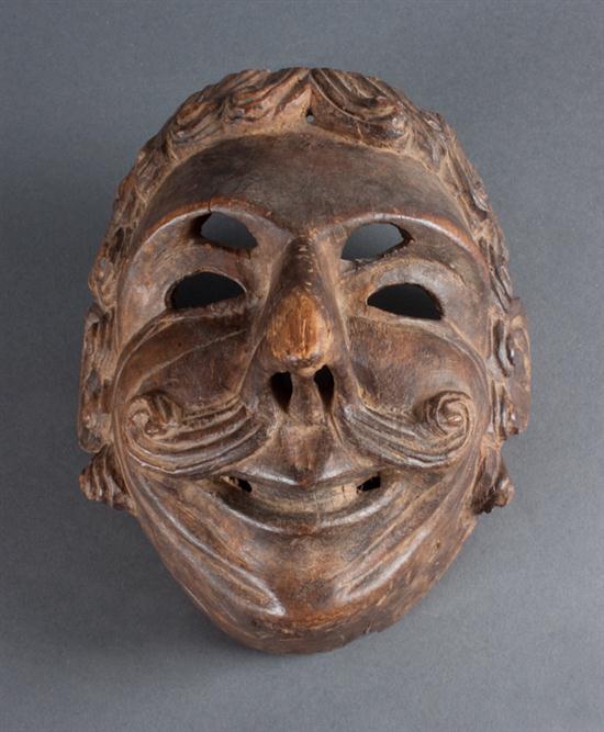 Guatemalan carved wooden mask representing