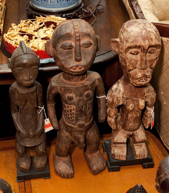 Three African carved wood figures 137328