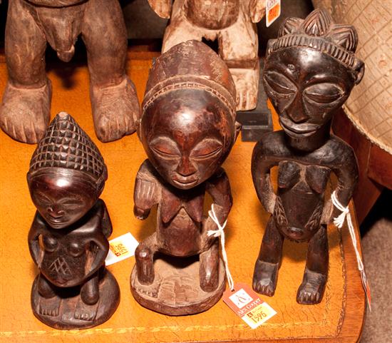 Three African carved wood figures 137329