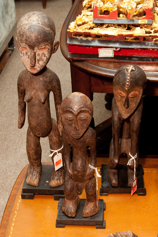 Three African carved wood figures 137327