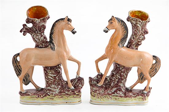 Pair Staffordshire figural spill