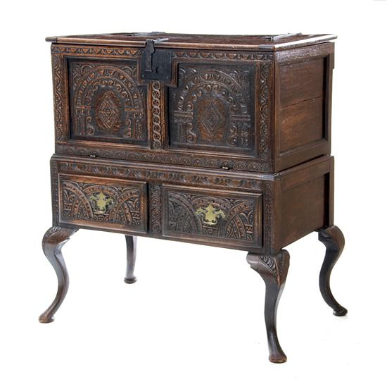 Jacobean style carved oak cabinet