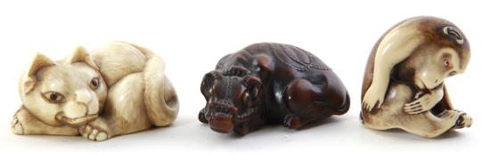 Japanese carved wood and ivory netsuke