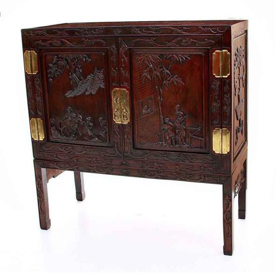 Carved Oriental hardwood cabinet on