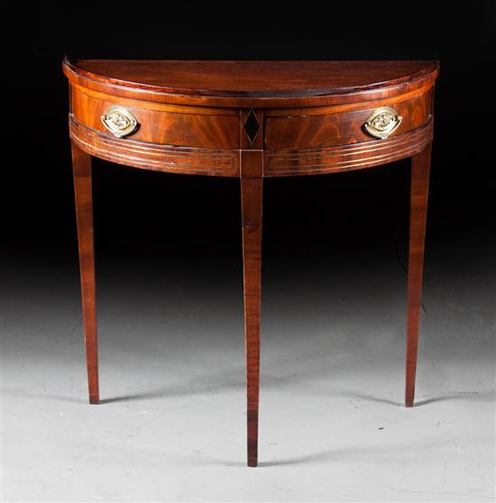 Regency brass inlaid mahogany demilune