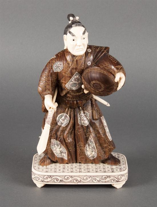 Japanese carved wood and ivory figure