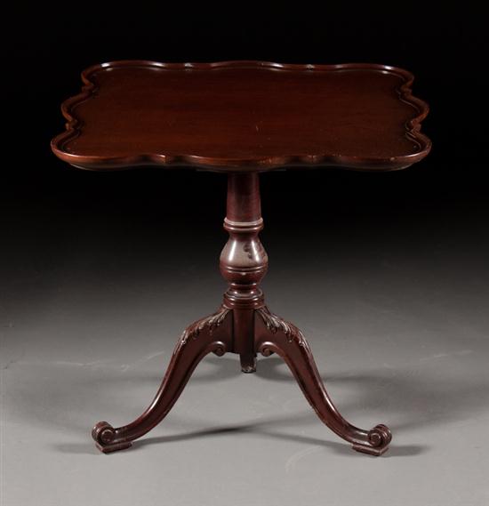 Chippendale style carved mahogany tilt-top
