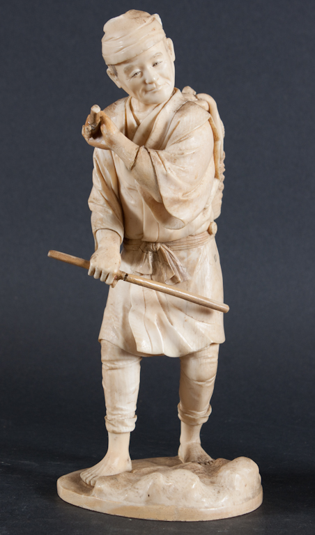 Japanese carved ivory figure of a fisherman