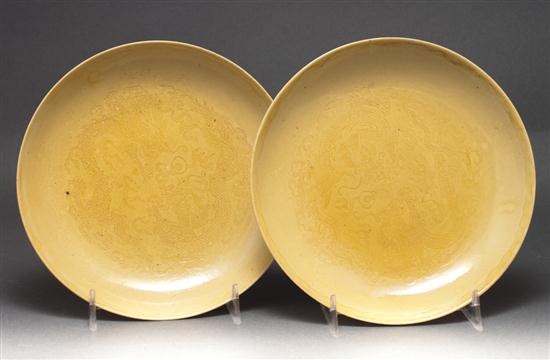 Pair of Chinese yellow glaze incised