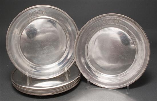 Eight American silver bread plates 136488