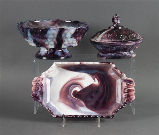 Three amethyst marbled glass articles