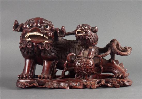 Chinese carved hardwood foo dog and