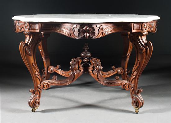 Rococo Revival carved walnut marble-top