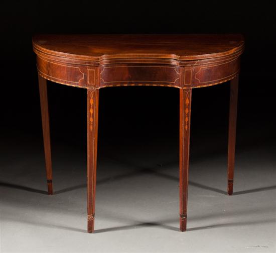 Federal style inlaid mahogany concave-front