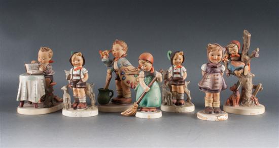 Seven assorted Hummel figurines