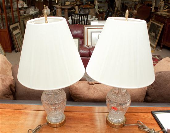 Pair of brass-mounted crystal lamps
