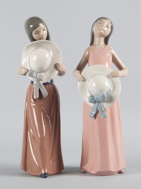 Two Lladro porcelain figures each