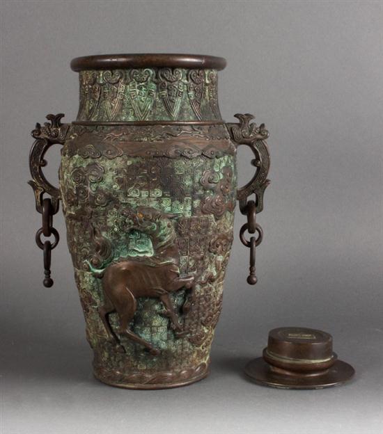 Japanese archaistic patinated bronze