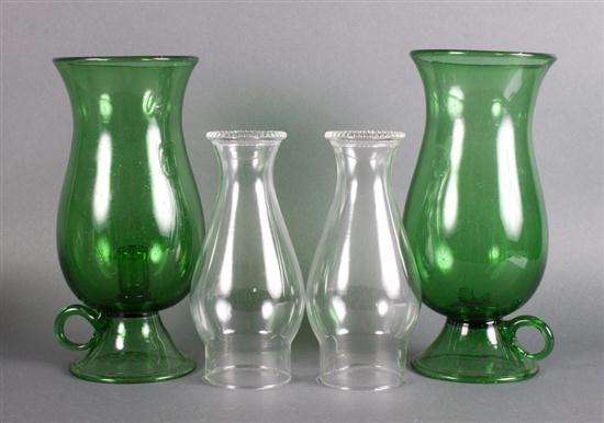 Pair of green glass candle holders