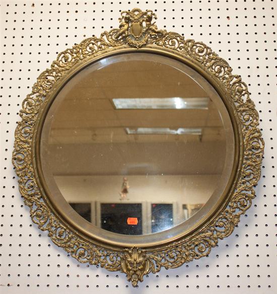 Continental brass mirror with putti 139c51