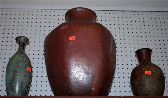Three patinated metal vases Estimate 139c81