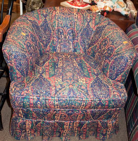 Overstuffed upholstered barrel-back