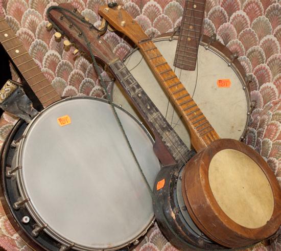 Two banjos and two banjo ukuleles