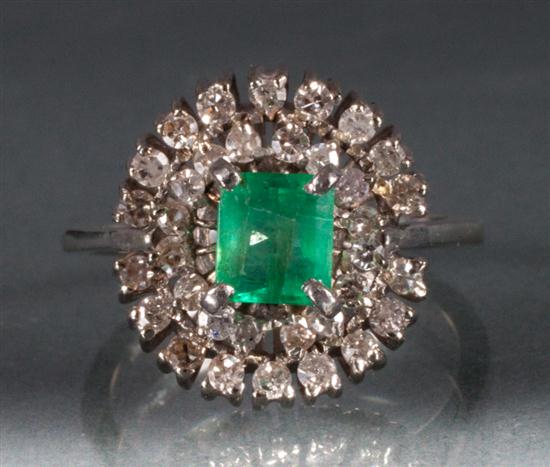 Diamond and emerald dinner ring